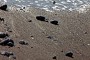 strand-schwarzer-sand-la-palma-steine-wasser-meer